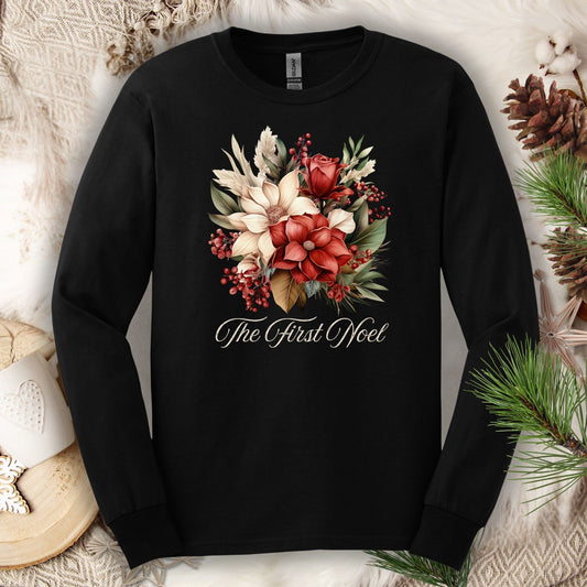 Black Gildan long sleeve tee with a watercolor Christmas bouquet of poinsettias, roses, and "The First Noel" text.