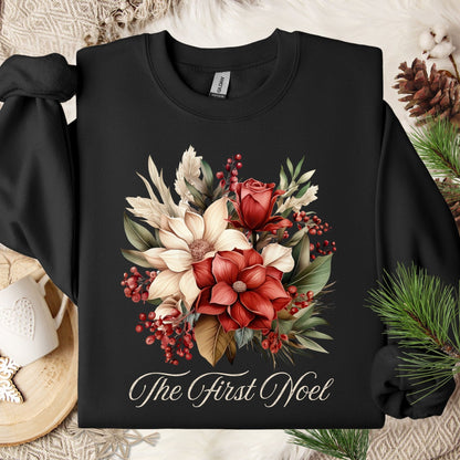 Black Gildan sweatshirt with vintage poinsettia, white rose bouquet, "The First Noel" text.