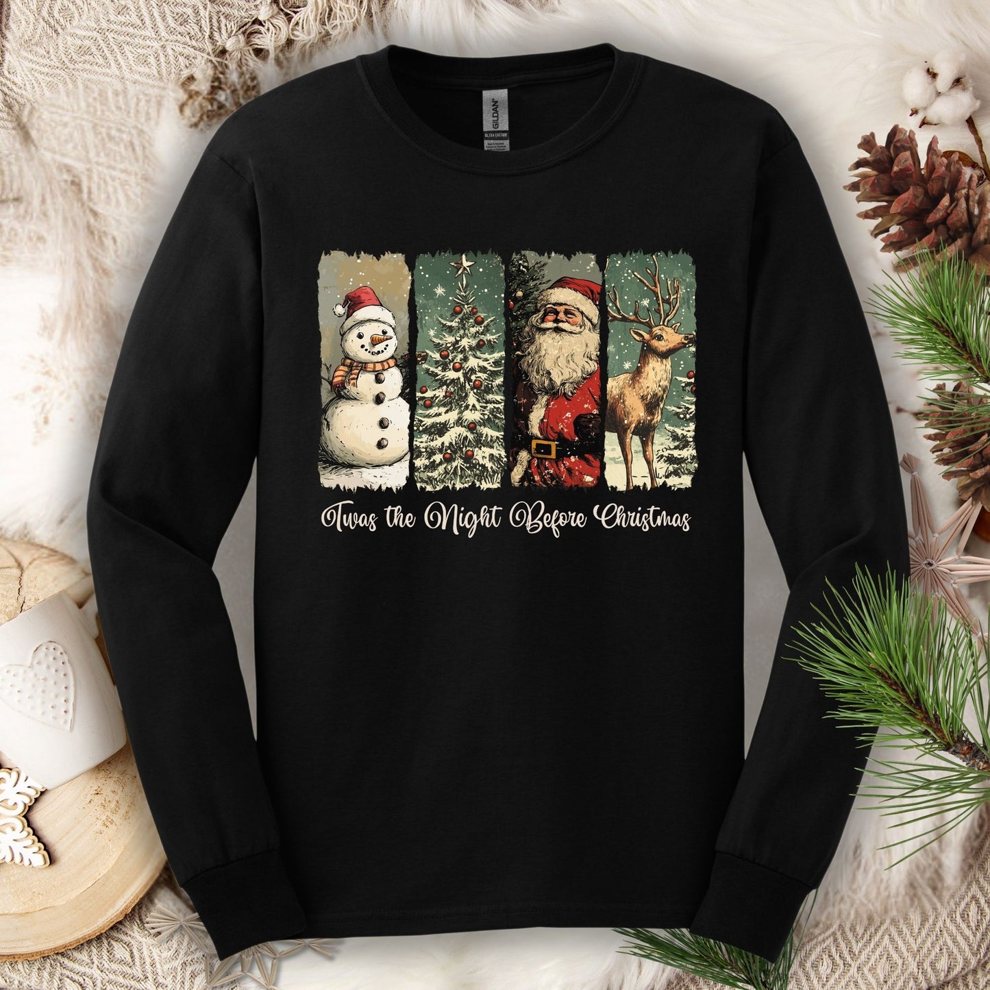 Black Gildan long sleeve tee with vintage Santa, reindeer, snowman, and tree design in earthy tones.