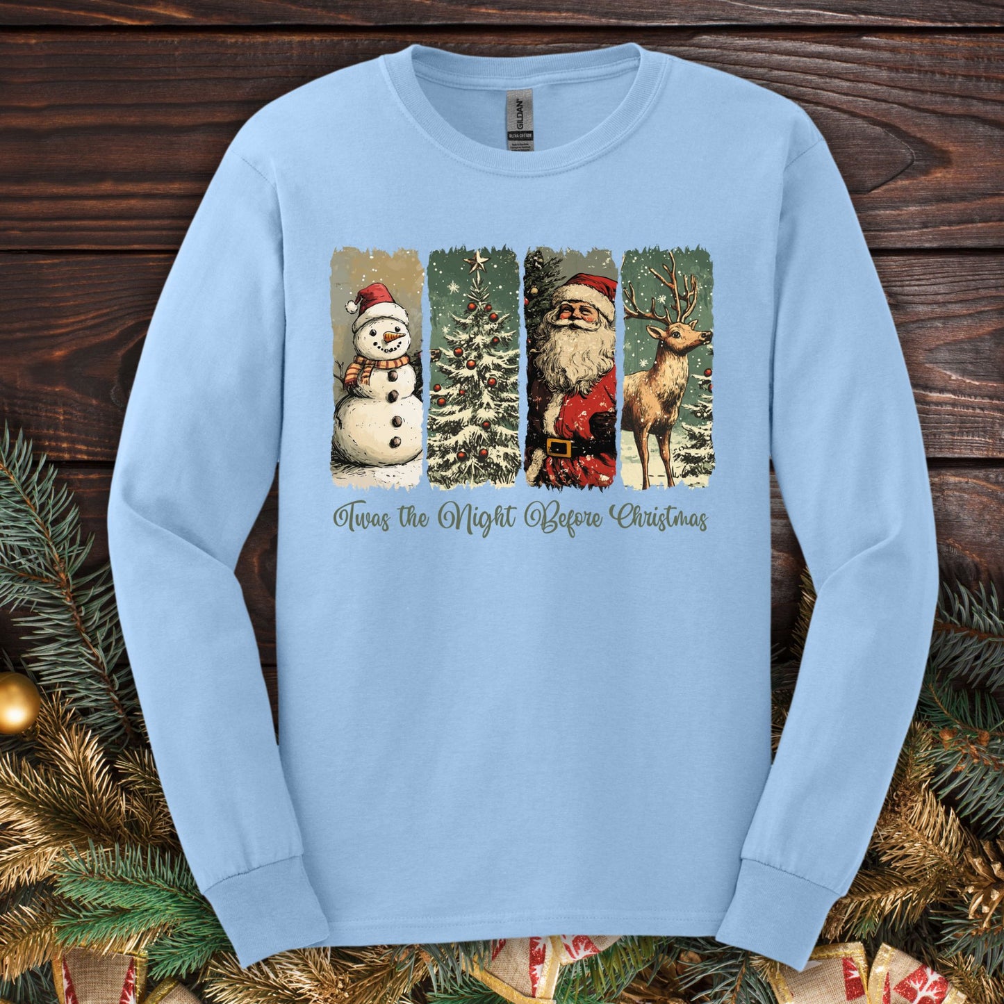Light blue Gildan long sleeve tee with vintage Santa, reindeer, snowman, and tree design.