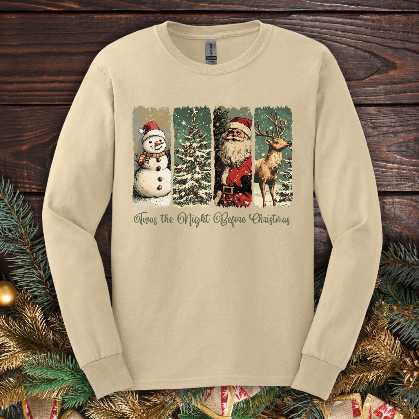 Sand Gildan long sleeve tee with vintage Santa, reindeer, snowman, and tree design.