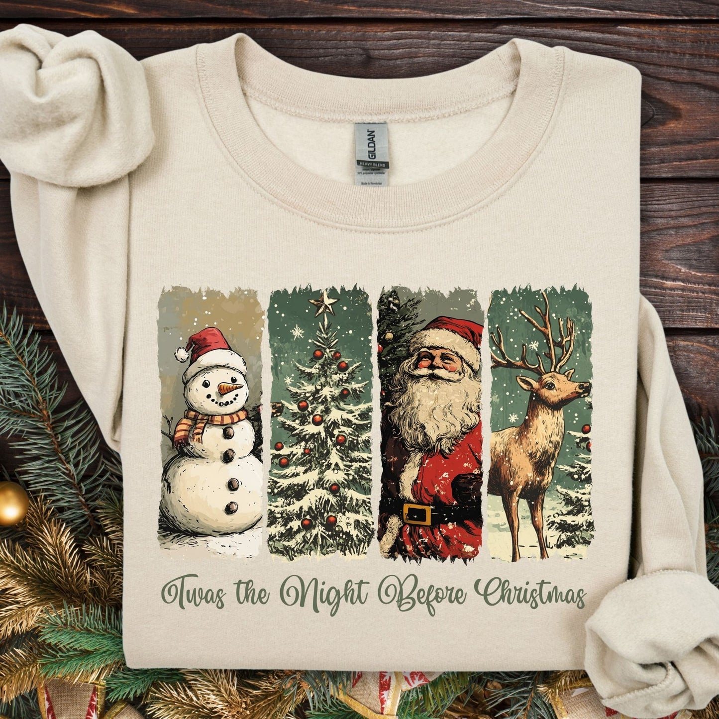 Sand Gildan sweatshirt with vintage Santa, reindeer, and snowman design; "Twas the Night Before Christmas" text.