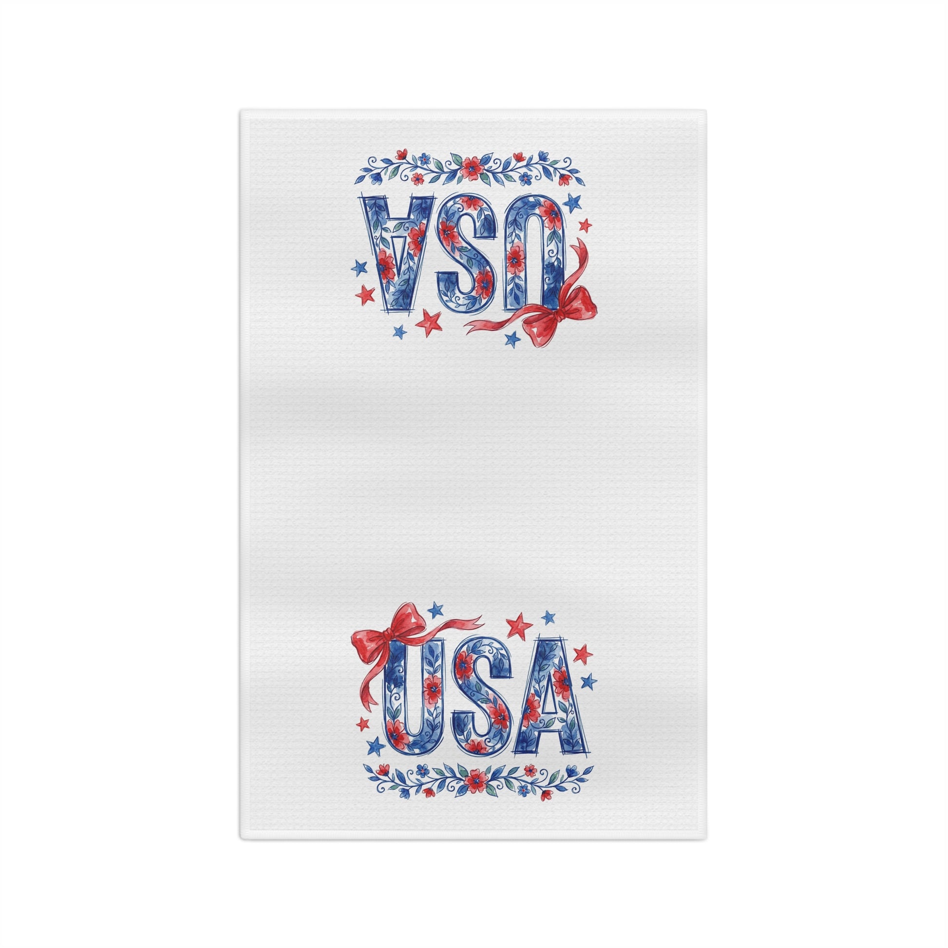 White microfiber tea towel with "USA" in blue floral script, red bows, and stars.