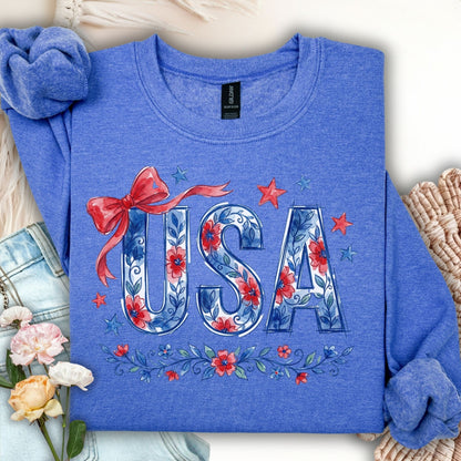 Heather Sport Royal USA Patriotic Floral Sweatshirt with red bow, stars, and blue floral lettering.