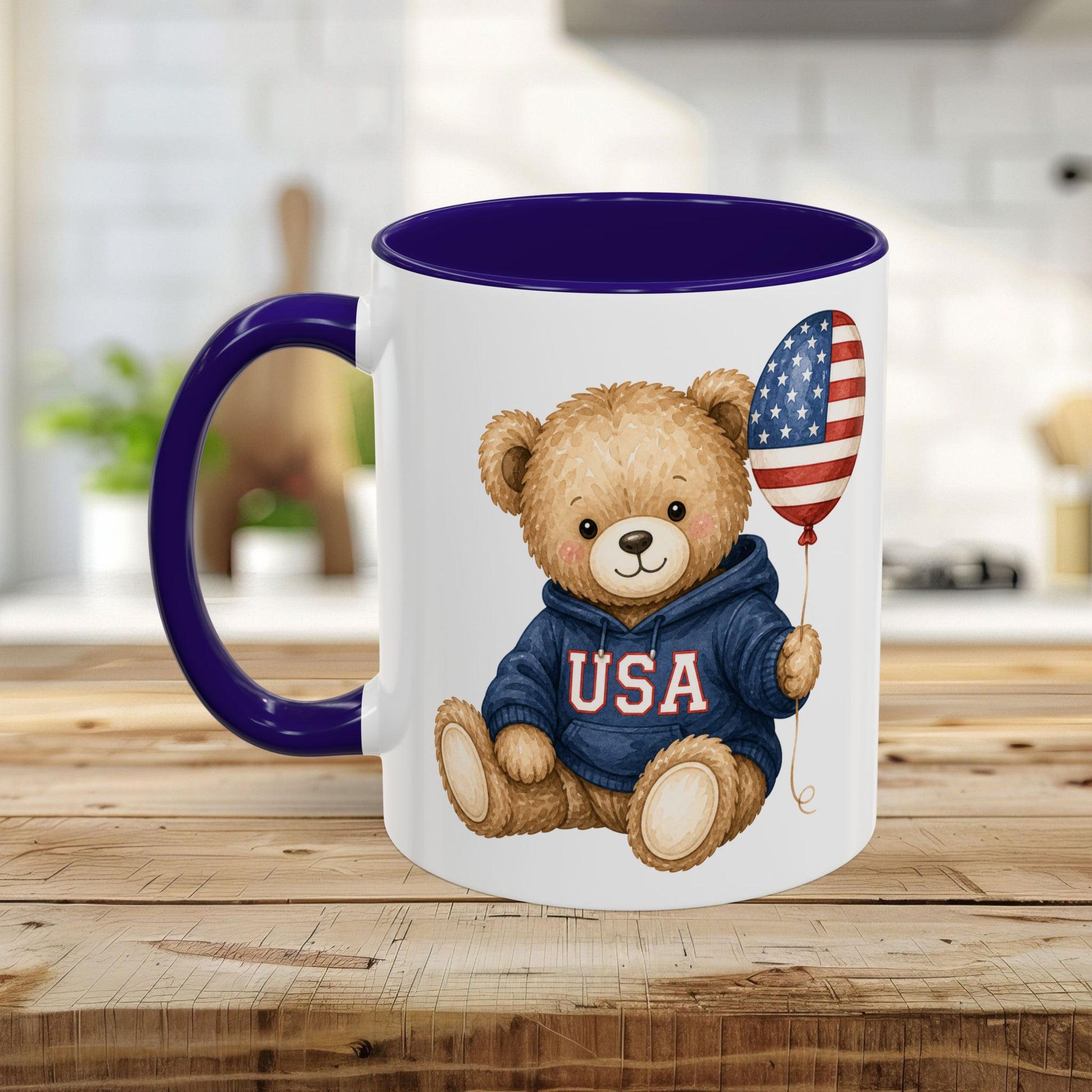 White ceramic mug with a purple handle and interior, featuring a teddy bear in a USA hoodie holding a flag balloon.