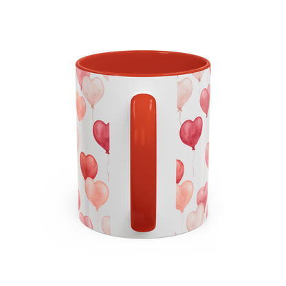 White ceramic mug with red interior and handle, featuring pink and red watercolor heart balloons.