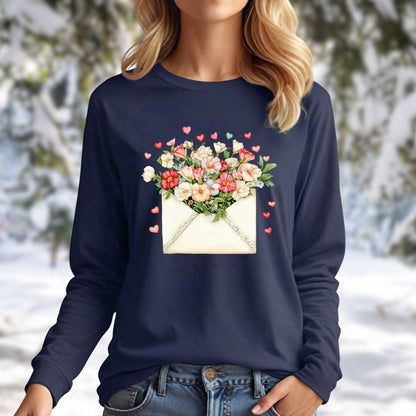 Navy long-sleeve tee with a vintage envelope spilling hand-drawn hearts and pink/cream floral blooms.