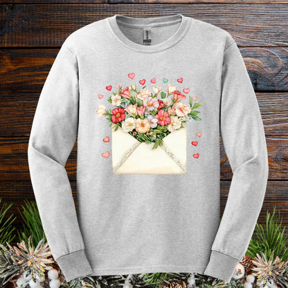 Ash long sleeve tee with vintage envelope spilling pink/cream blooms and hearts.