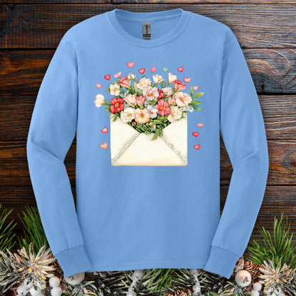 Carolina Blue long sleeve tee with a vintage envelope spilling pink and cream flowers and hearts.