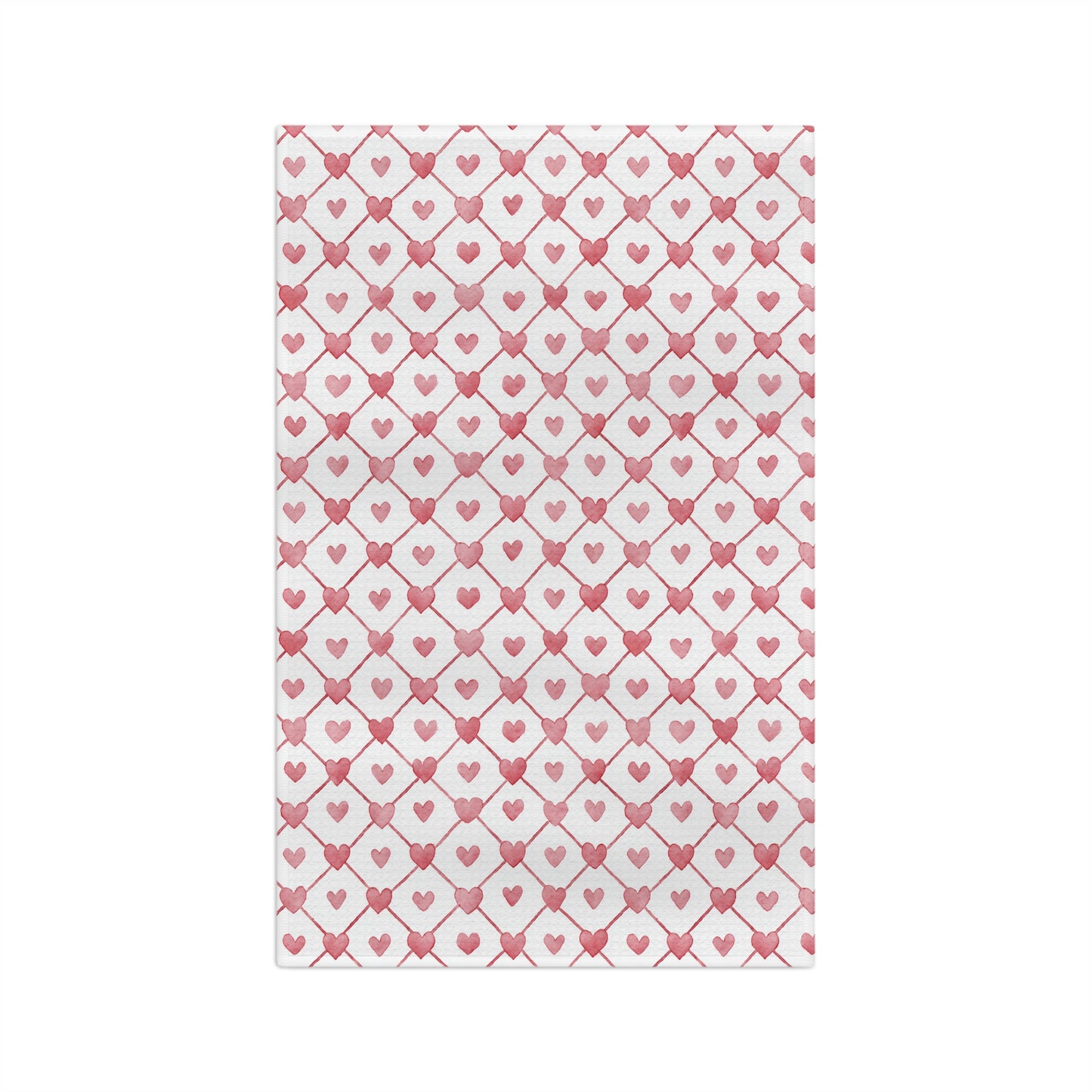 White microfiber tea towel with a geometric pattern of red hearts and diagonal lines.