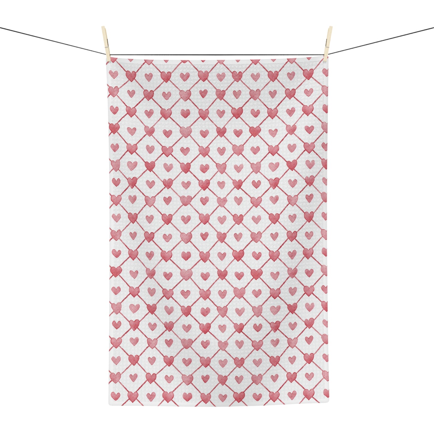 Valentine's Heart Geometric Pattern Microfiber Tea Towel with red hearts on a white background, hanging on a clothesline.