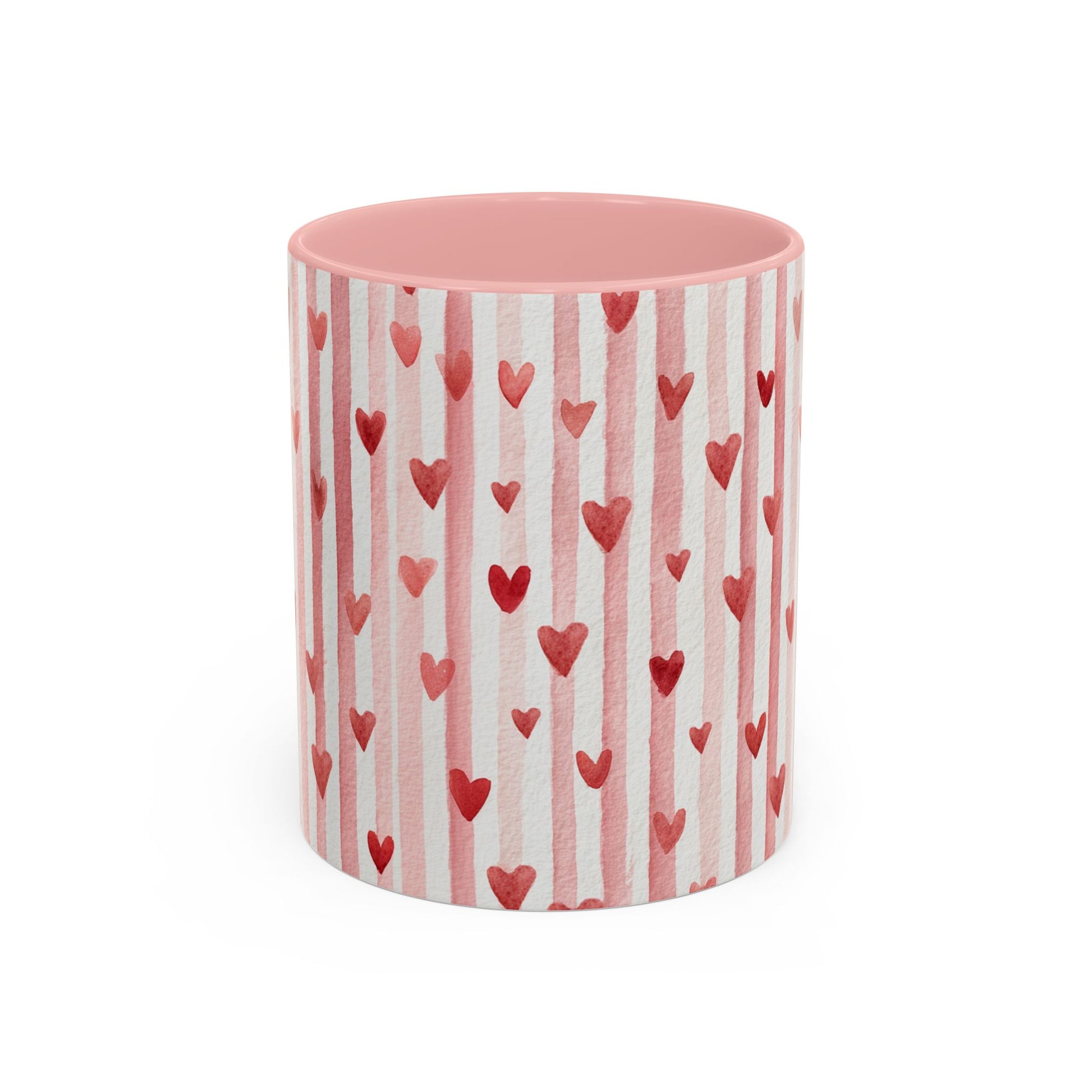 Glossy white ceramic mug with pink watercolor stripes, red hearts, and a pink interior.