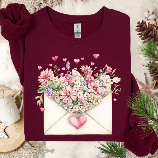 Maroon cotton-polyester sweatshirt with a vintage floral envelope design, pink flowers, and hearts.