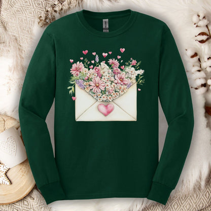 Forest Green long sleeve tee with a vintage heart envelope overflowing with pink flowers.