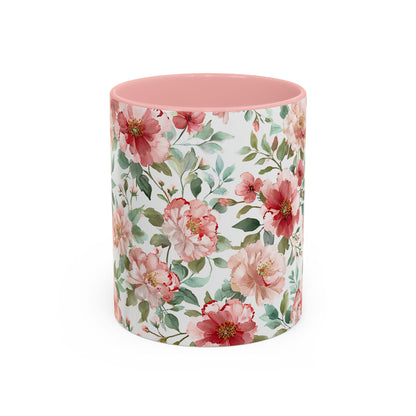 Glossy ceramic mug with pink interior and handle, featuring a vibrant watercolor print of pink and red peonies.