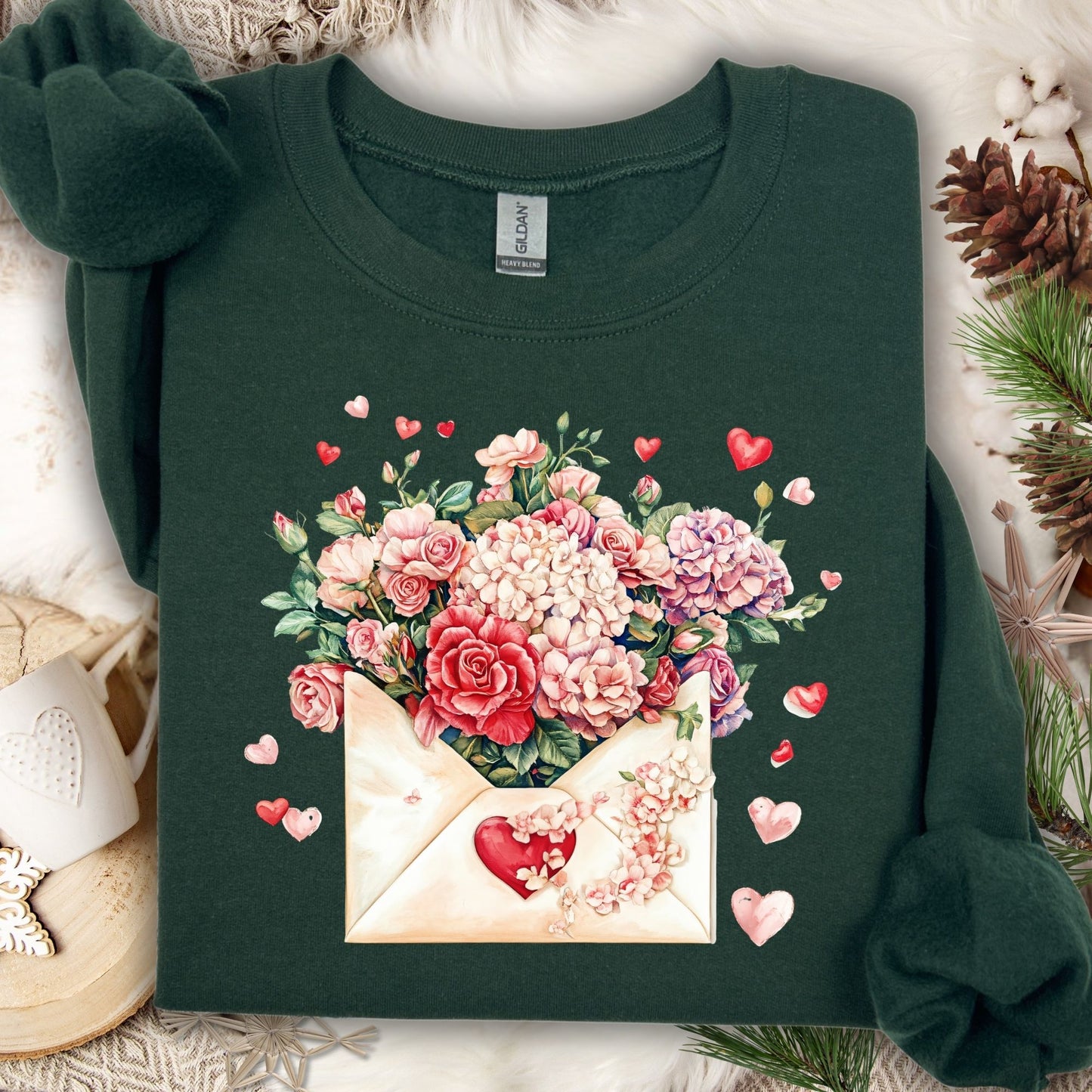 Forest Green unisex sweatshirt with a vintage floral envelope design of red, pink, and ivory flowers and hearts.