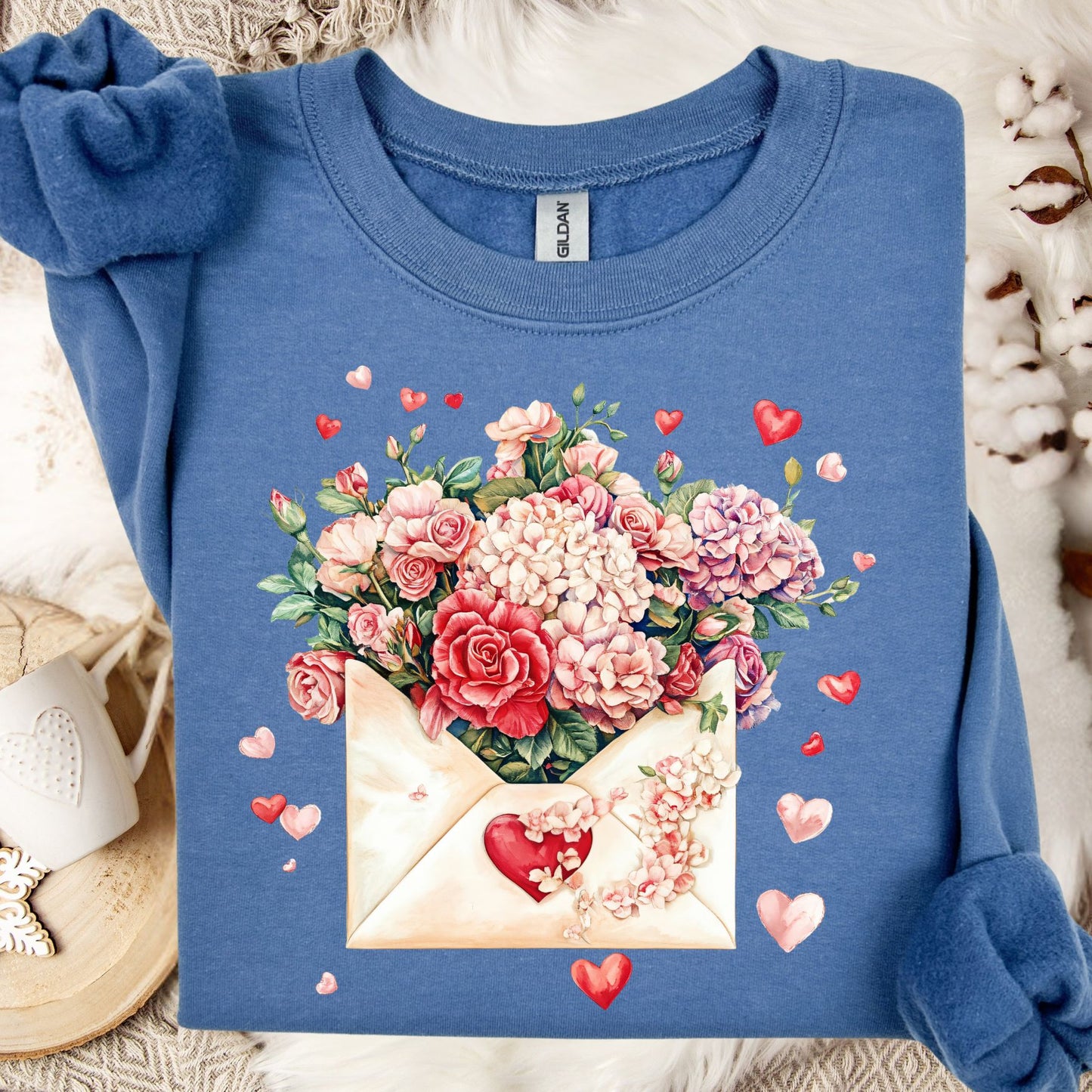 Indigo Blue cotton-polyester sweatshirt with a vintage floral envelope design and scattered hearts.