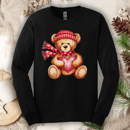 Black long sleeve tee with watercolor teddy bear holding a red heart, wearing a red hat and scarf.