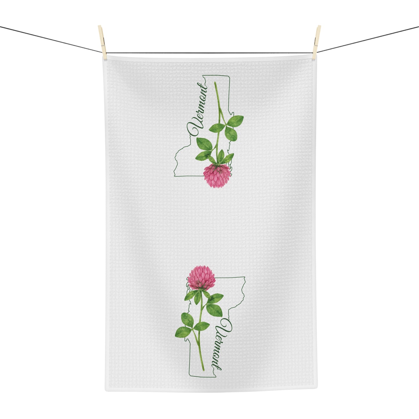 White microfiber tea towel with green Vermont state outline and pink red clover design.