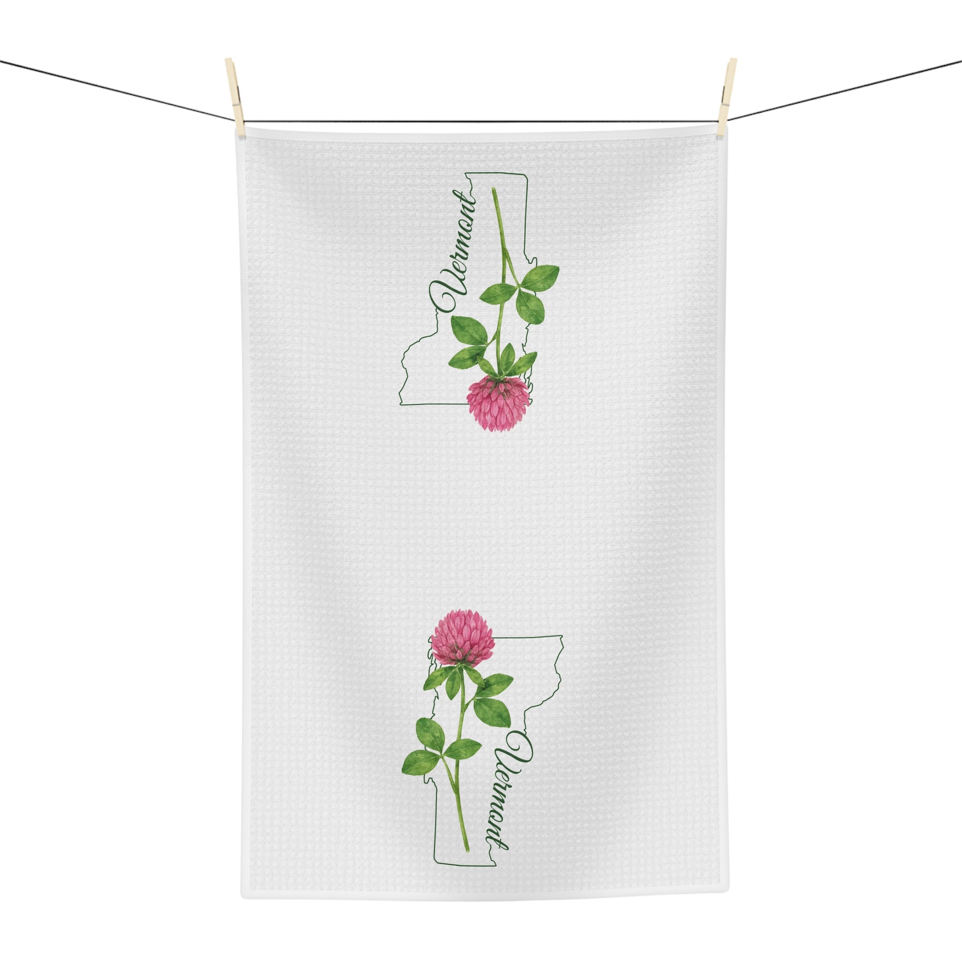 White microfiber tea towel with green Vermont state outline and pink red clover design.