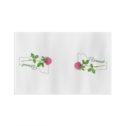 White microfiber tea towel with two pink red clover blooms and green Vermont state outline designs.