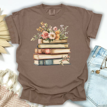 Espresso S t-shirt with a vintage stack of books and wildflowers print.