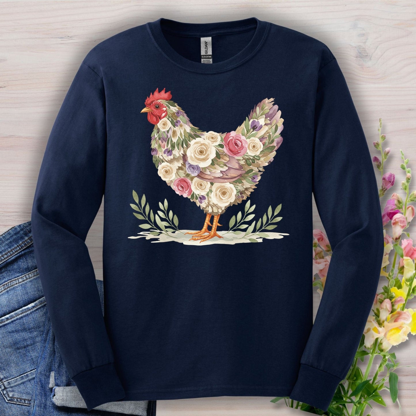 Navy long sleeve tee with a vintage floral hen design in muted roses and greenery.