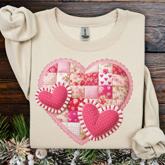 Sand vintage faux patchwork heart sweatshirt with padded heart accents and scalloped edges.
