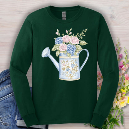 Forest Green long sleeve tee with a vintage watering can and floral arrangement in watercolor style.