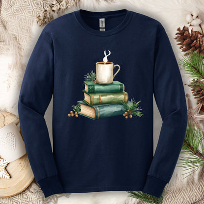 Navy long sleeve tee with a watercolor stack of vintage green books and a steaming coffee mug.