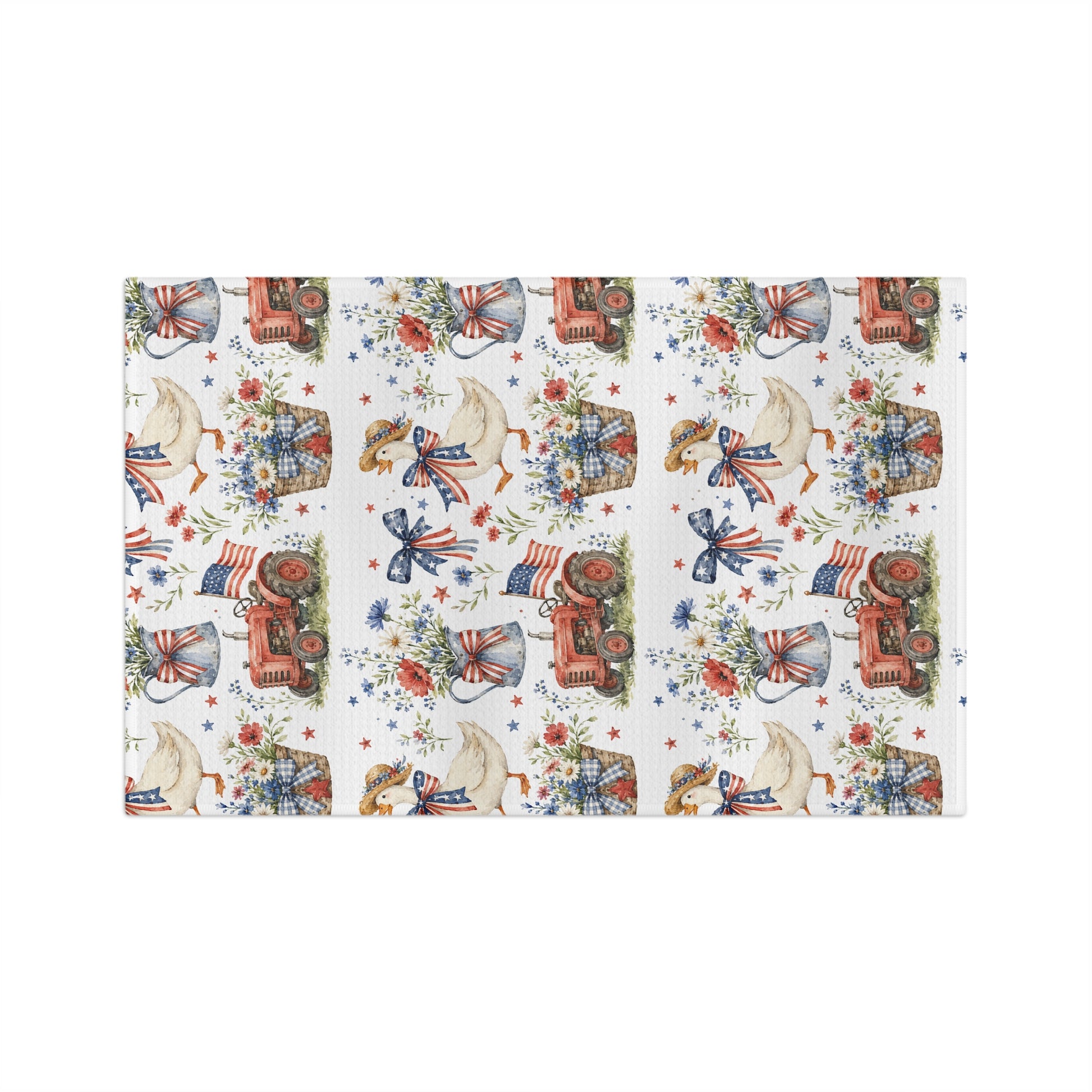 White microfiber tea towel with a vintage patriotic farmhouse pattern featuring geese, tractors, and floral baskets.