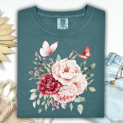 Blue Spruce garment-dyed t-shirt with a watercolor peony and butterfly bouquet.
