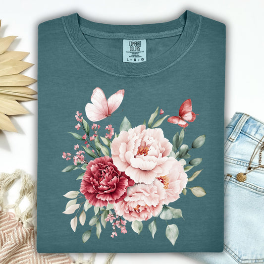 Blue Spruce garment-dyed t-shirt with a watercolor peony and butterfly bouquet.