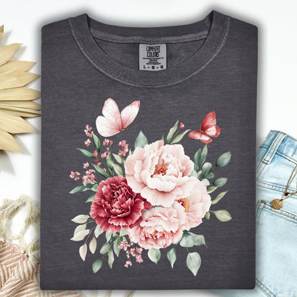 Pepper S, garment-dyed cotton t-shirt with a watercolor peony and butterfly bouquet design.