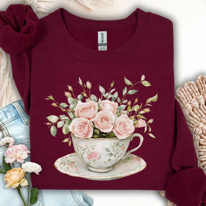 Maroon sweatshirt with a vintage rose bouquet in a teacup and saucer design.
