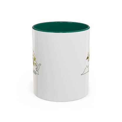 White ceramic mug with a green interior and handle, featuring a Virginia state flower dogwood design.