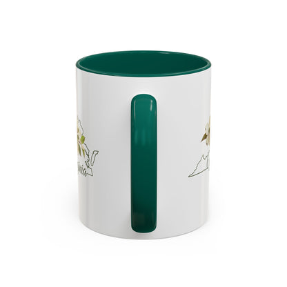 White ceramic mug with green interior and handle, featuring a Virginia state silhouette and dogwood flower design.