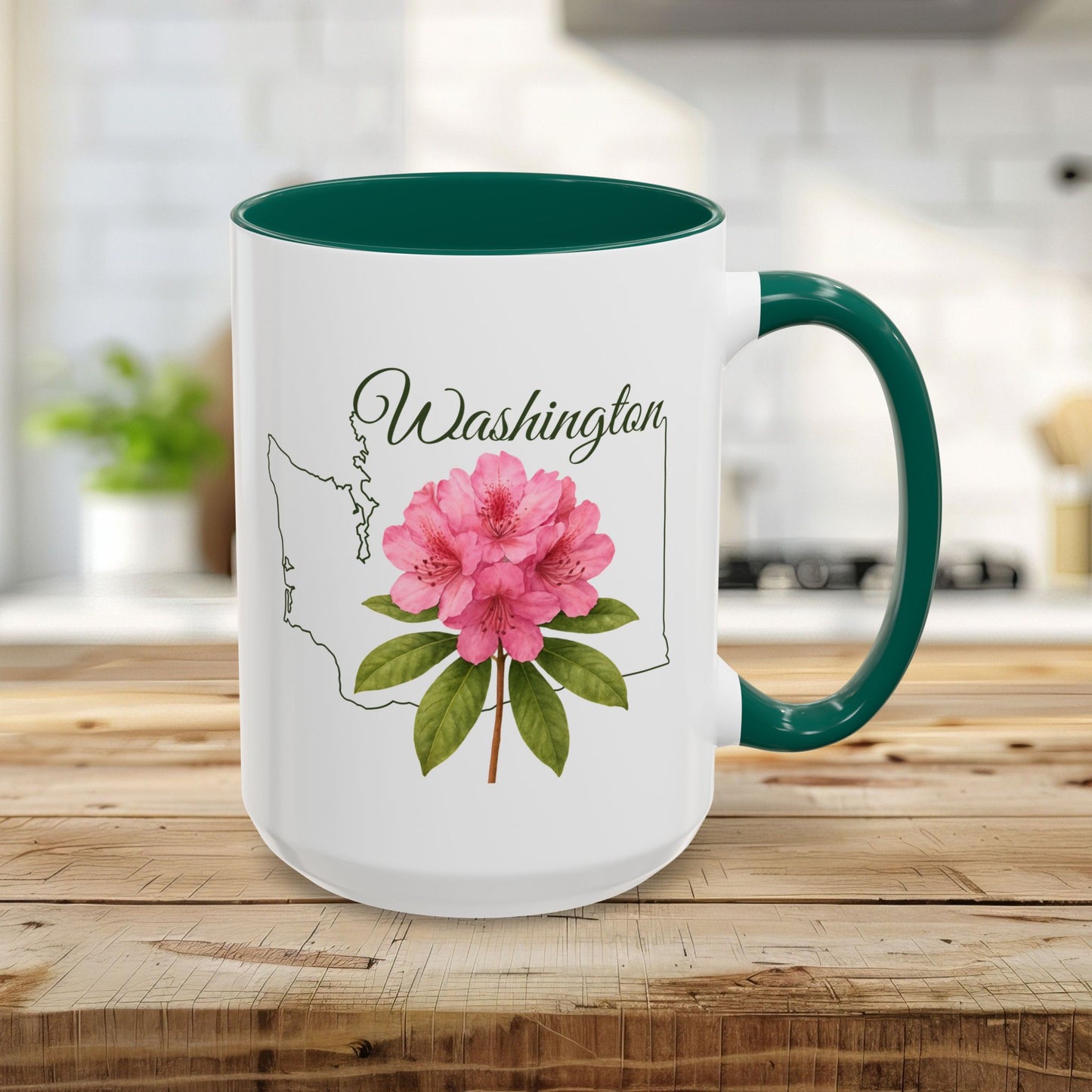 15oz white ceramic mug with green handle and interior, featuring a pink rhododendron and Washington state outline.