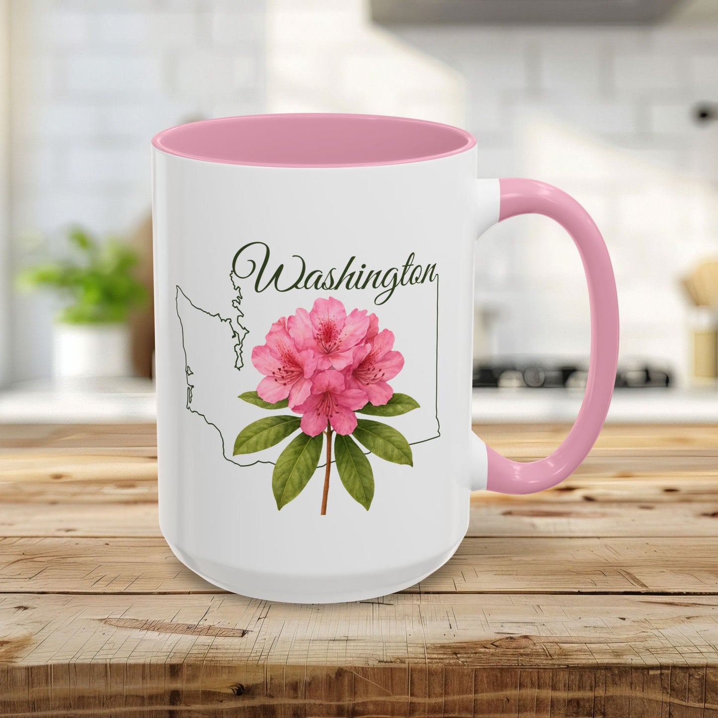 15oz white ceramic mug with pink interior/handle, featuring a Washington state outline and pink rhododendron.