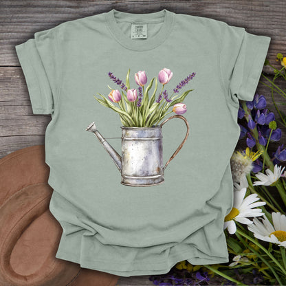 Bay S t-shirt with a vintage watering can holding purple tulips and lavender.