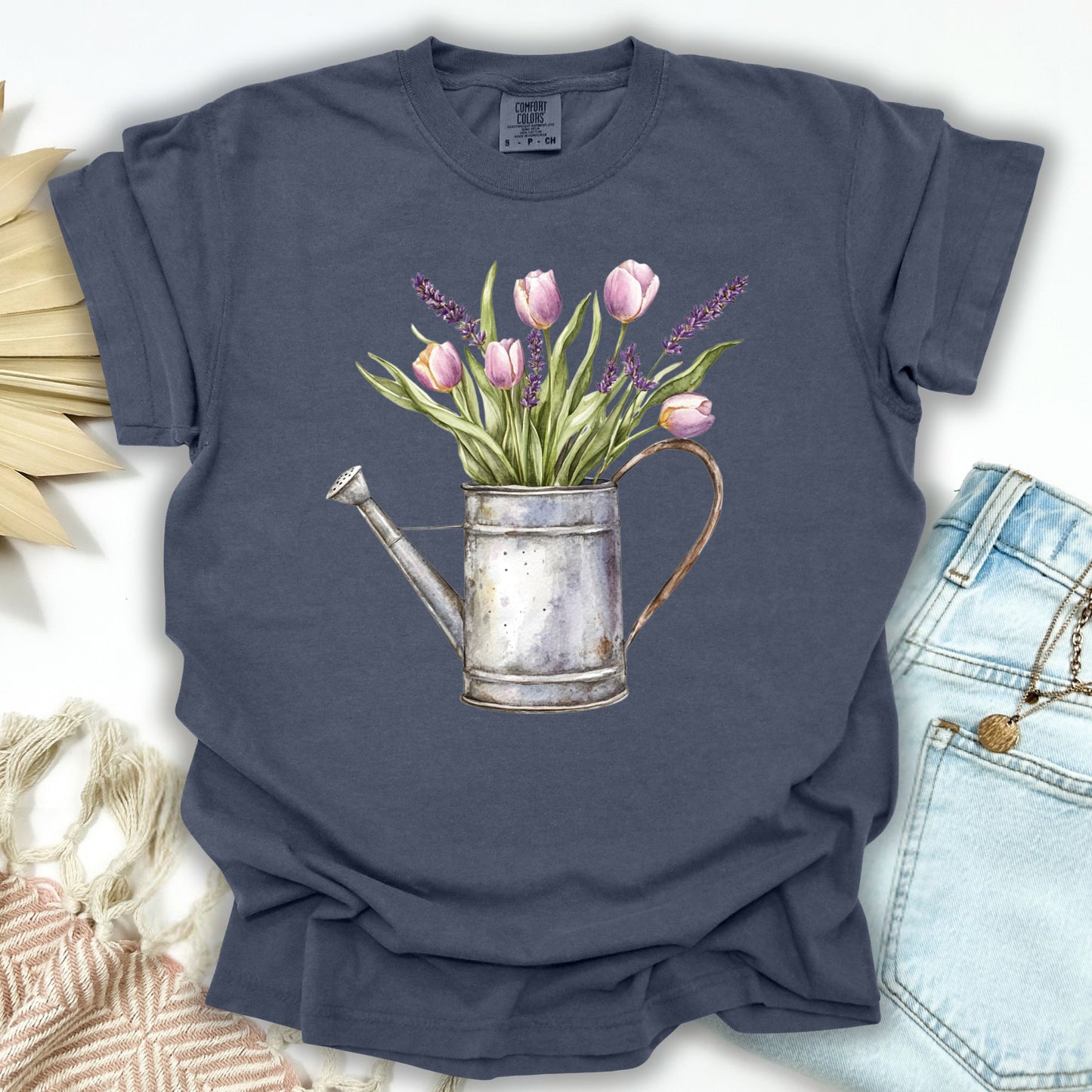Denim S t-shirt with a vintage watering can and purple tulips botanical illustration.