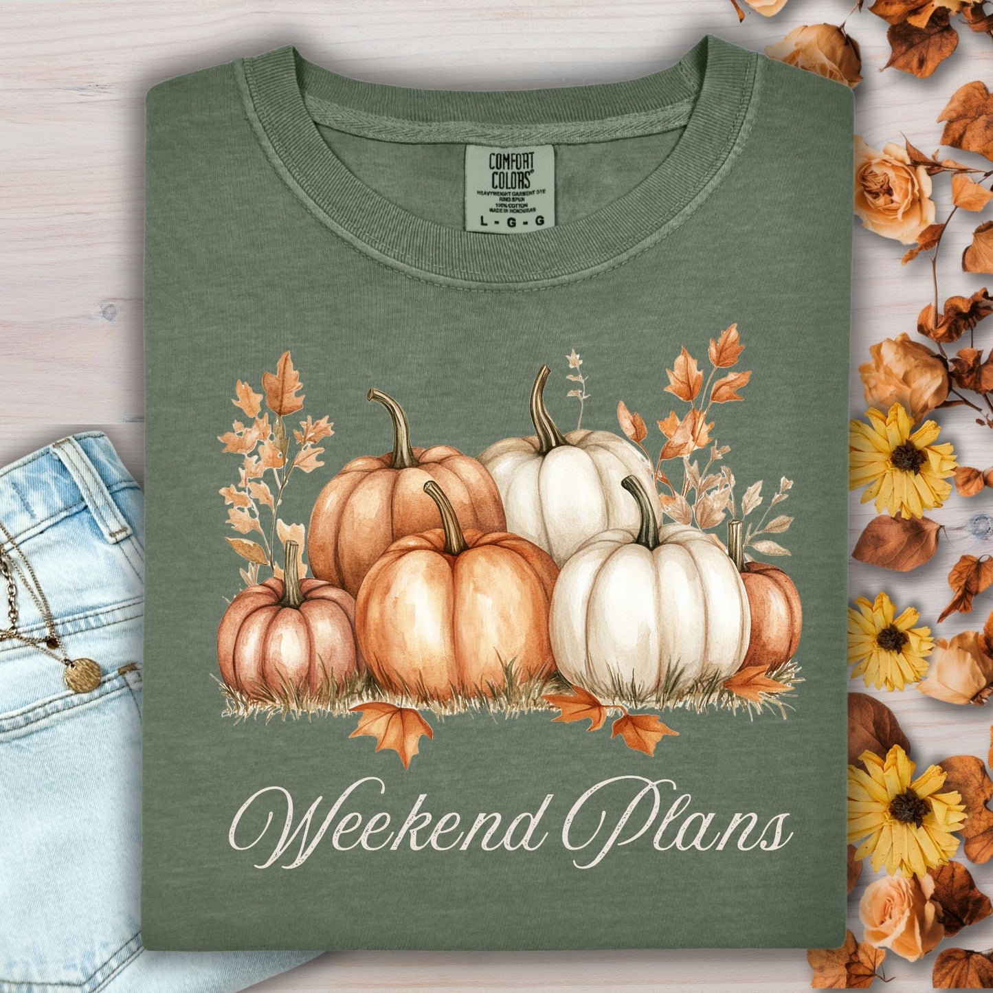 Moss green Comfort Colors t-shirt, size S, with watercolor pumpkins and "Weekend Plans" text.