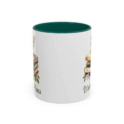 White ceramic mug with a green interior and handle, featuring a watercolor stack of books and floral teacup.