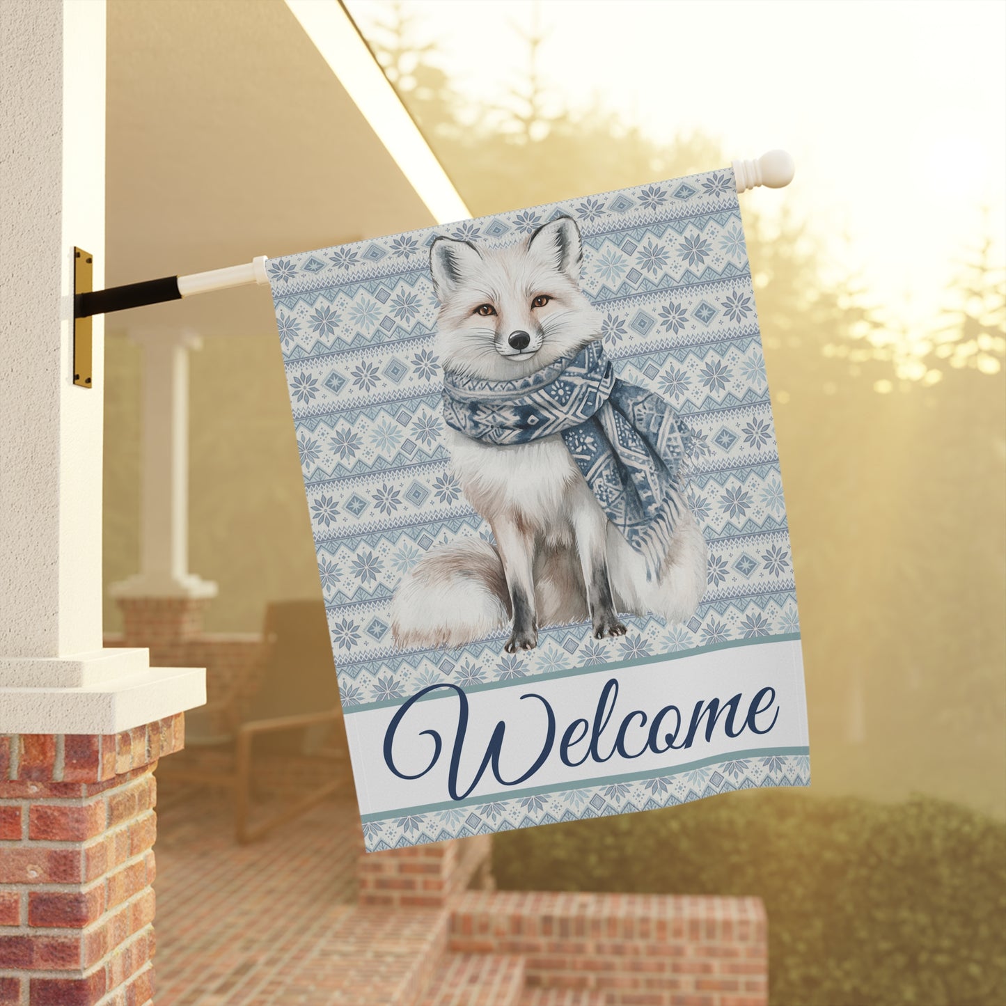 Nordic winter fox garden flag with a white fox in a blue scarf on a Fair Isle background.