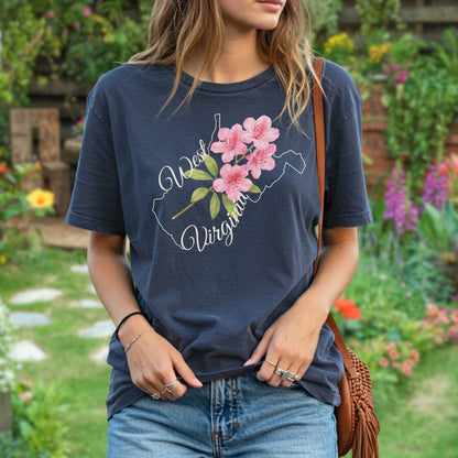 Garment-dyed navy t-shirt with a watercolor rhododendron inside a West Virginia state outline.