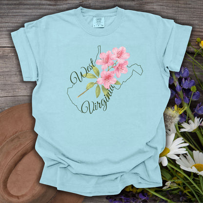 Chambray blue cotton t-shirt with West Virginia state outline and watercolor rhododendron design.