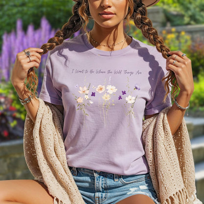 Relaxed-fit purple garment-dyed cotton t-shirt featuring watercolor wildflowers and hand-lettered text on the chest.