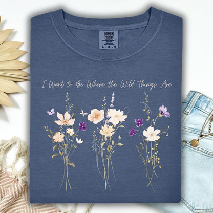 Denim Comfort Colors t-shirt with cream and purple wildflowers and "I Want to Be Where the Wild Things Are" text.