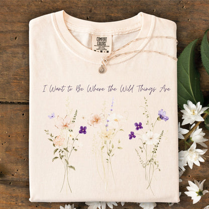 Ivory Comfort Colors t-shirt with "I Want to Be Where the Wild Things Are" and cream & purple wildflowers.