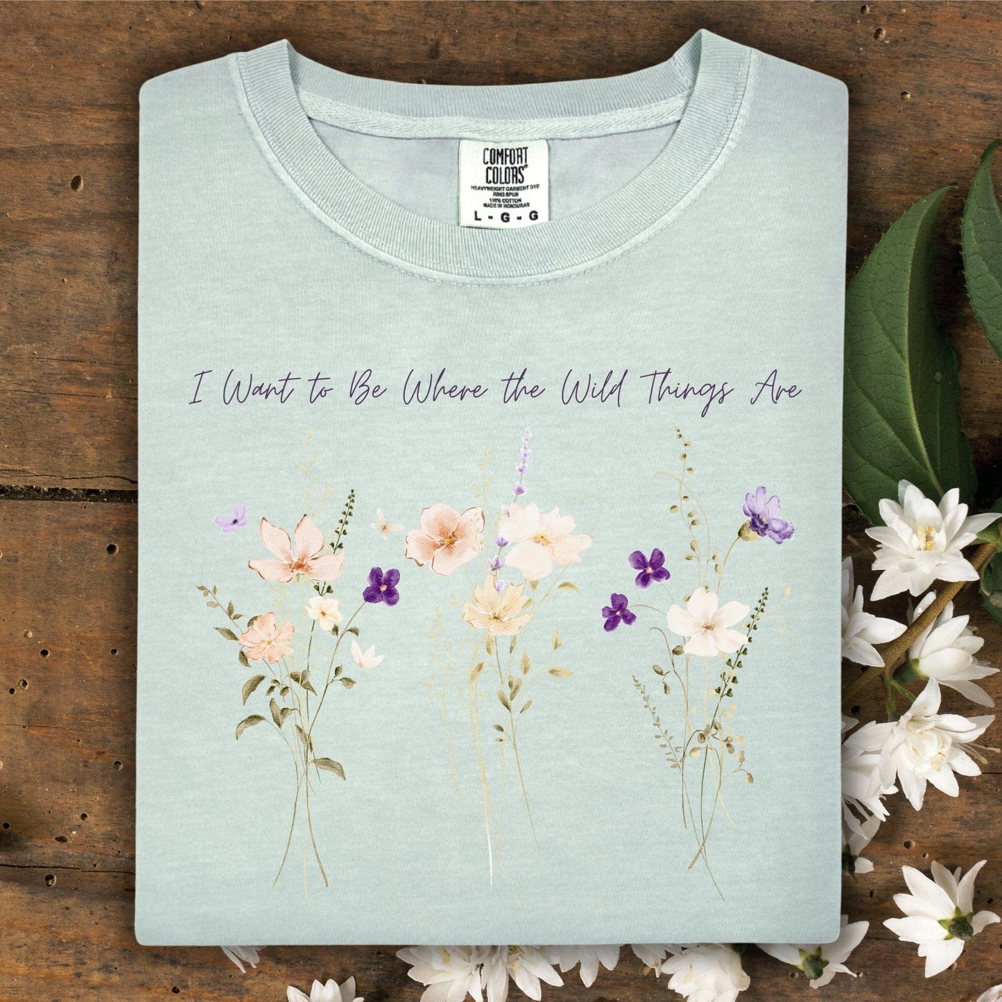 Bay Comfort Colors t-shirt with cream and purple wildflowers and "I Want to Be Where the Wild Things Are" text.